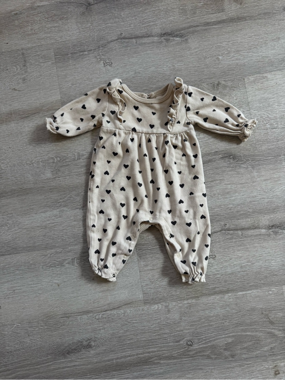 Cream Heart-Print Long-Sleeve Baby One-Piece with Ruffle Detail